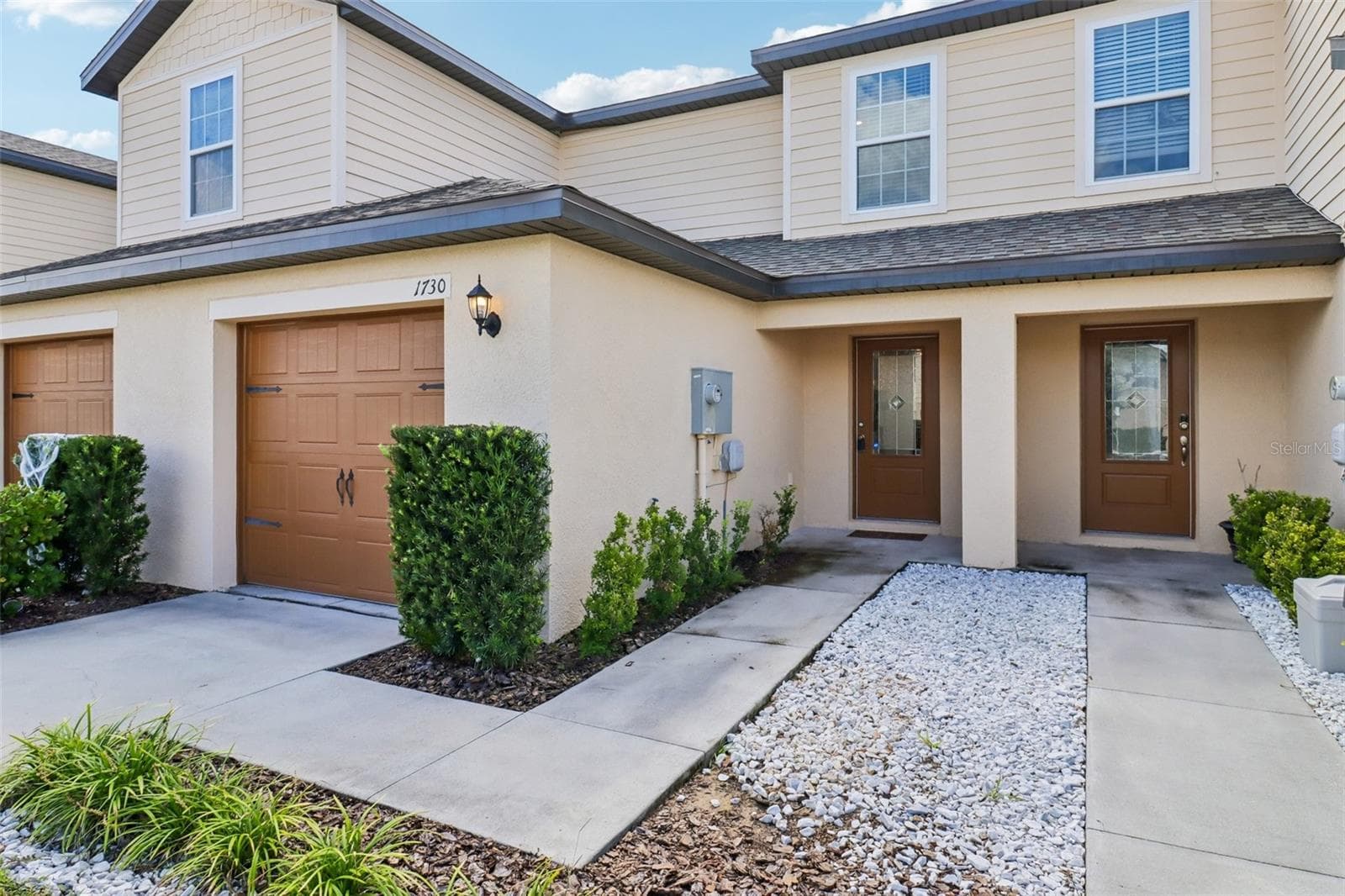 Front of House - Driveway & Garage - 1730 WYNFORD CIR, TAVARES