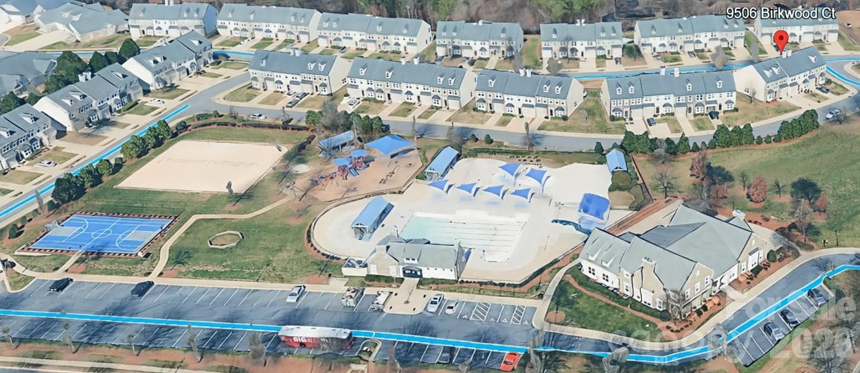 Aerial view of home's proximity across street from community pool and rec area - 9506 Birkwood Court, Charlotte