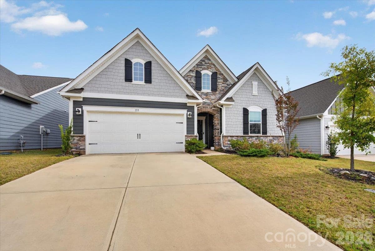 Spacious extended driveway offering ample parking for guests. - 155 White Apple Way, Statesville