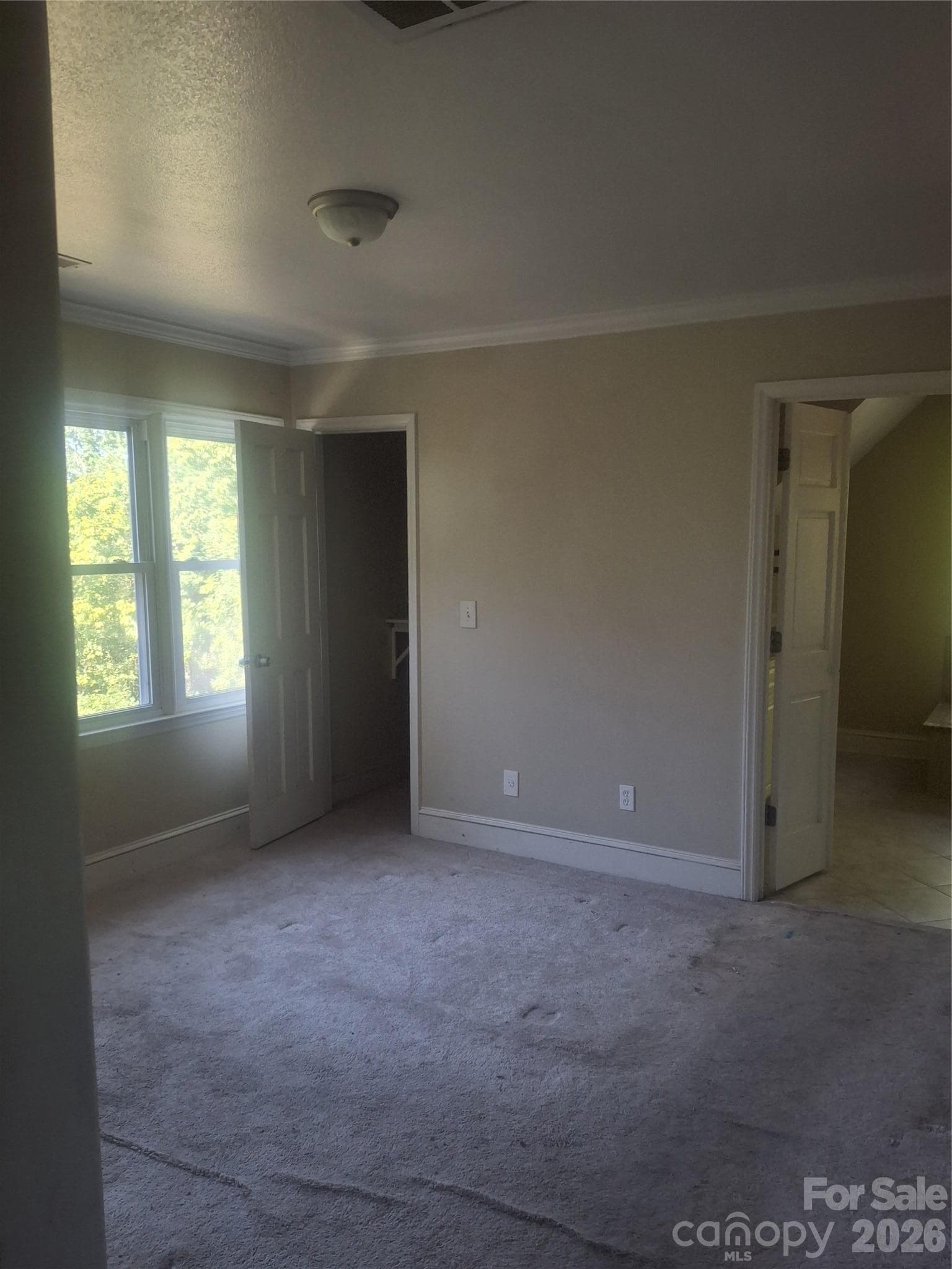 Primary bedroom Dressing room with 2 walk in closets - 9327 Willowglen Trail, Charlotte