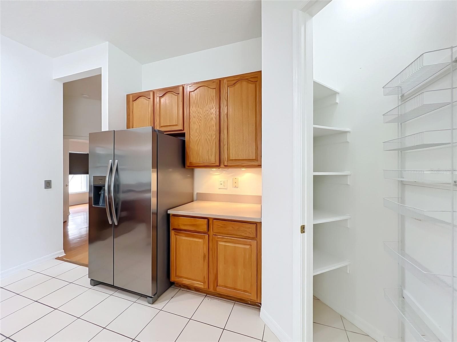 Kitchen walk-in pantry. - 2462 GREENWILLOW DR, ORLANDO