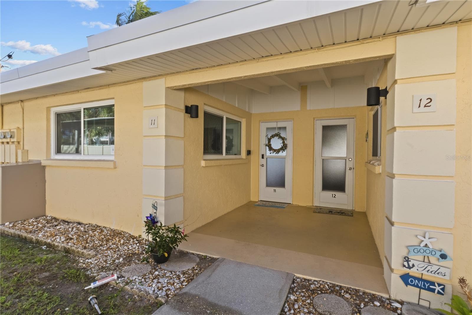 Park right outside your front door. - 6006 MIDNIGHT PASS RD #11, SARASOTA