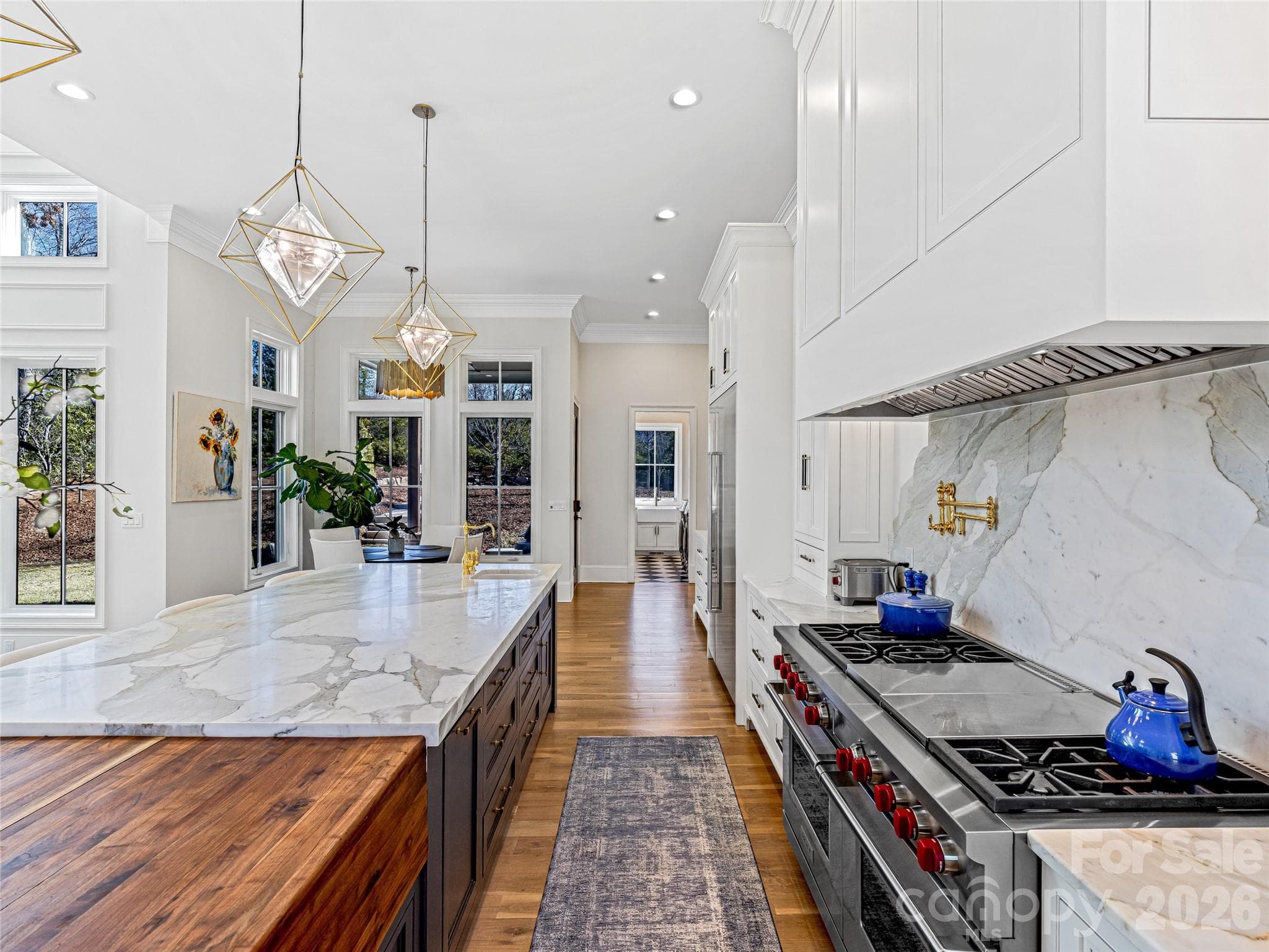 Wolf Range and custom range hood - 1905 White Tree Trail, Arden
