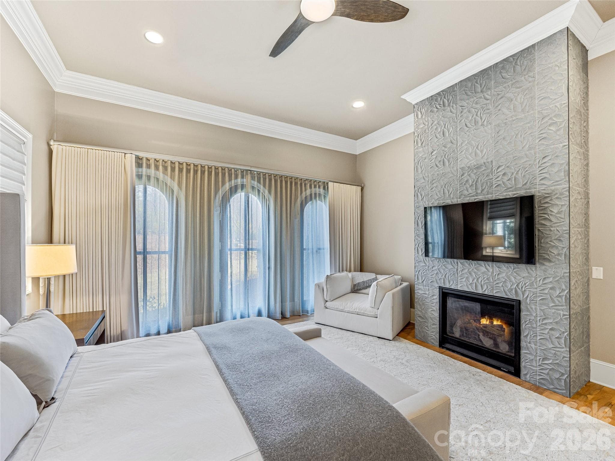 Primary Bedroom - Gas Fireplace, Custom Tile Surround, Electric Black Out Window Treatments - 1905 White Tree Trail, Arden