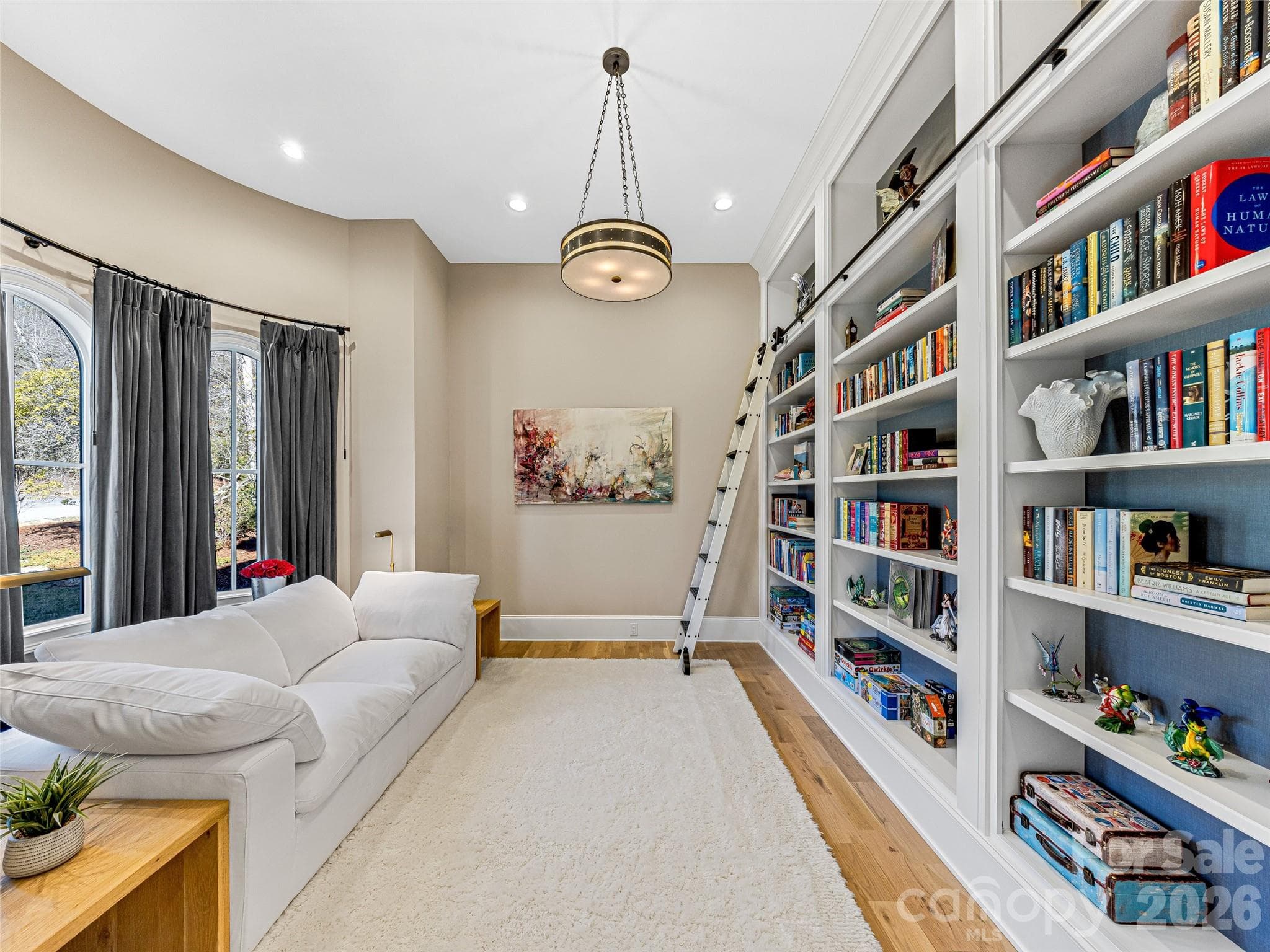 Library Room with custom shelving and lighting. - 1905 White Tree Trail, Arden