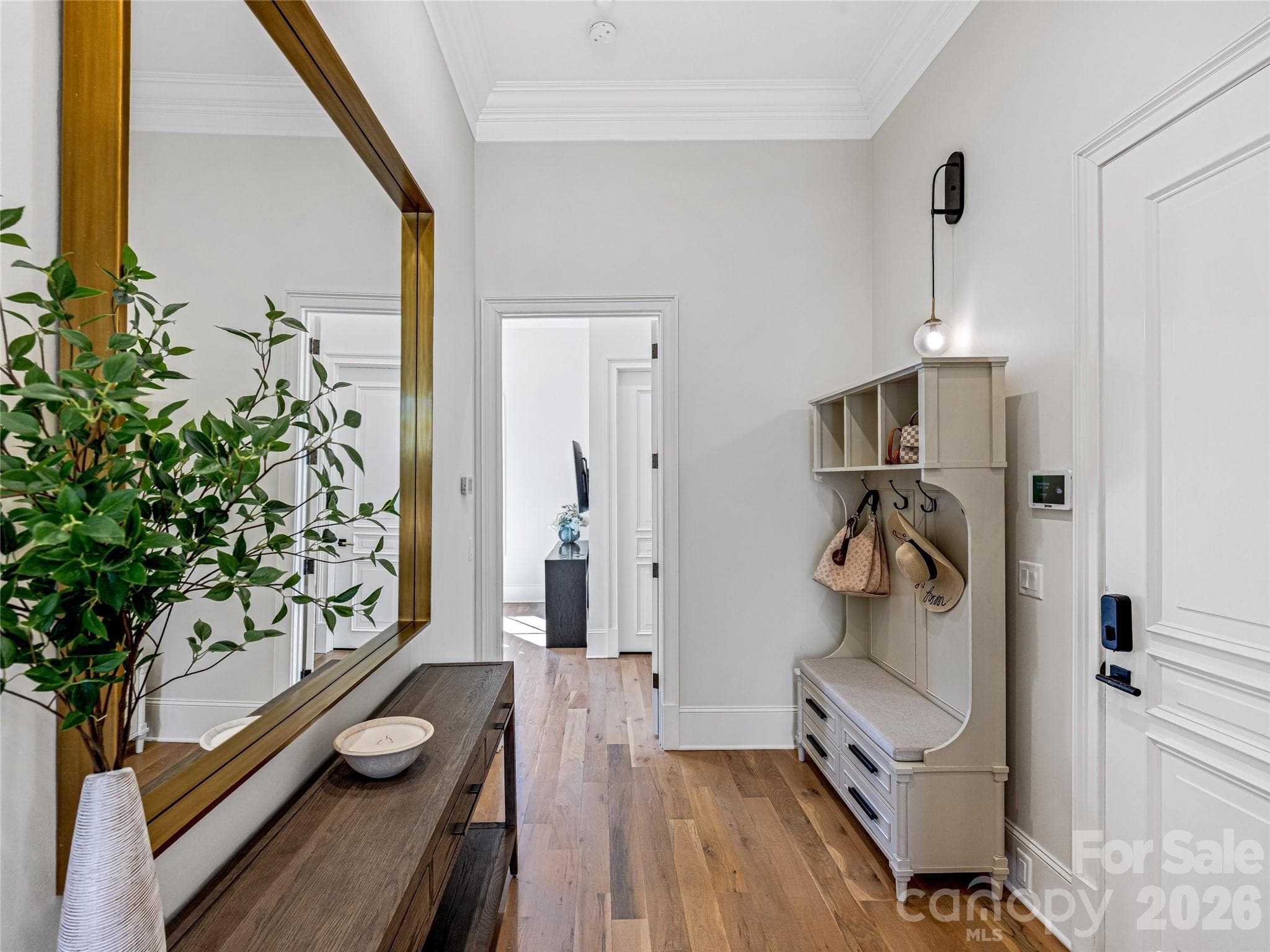 Hallway leading to additional guest bedroom on main level. - 1905 White Tree Trail, Arden