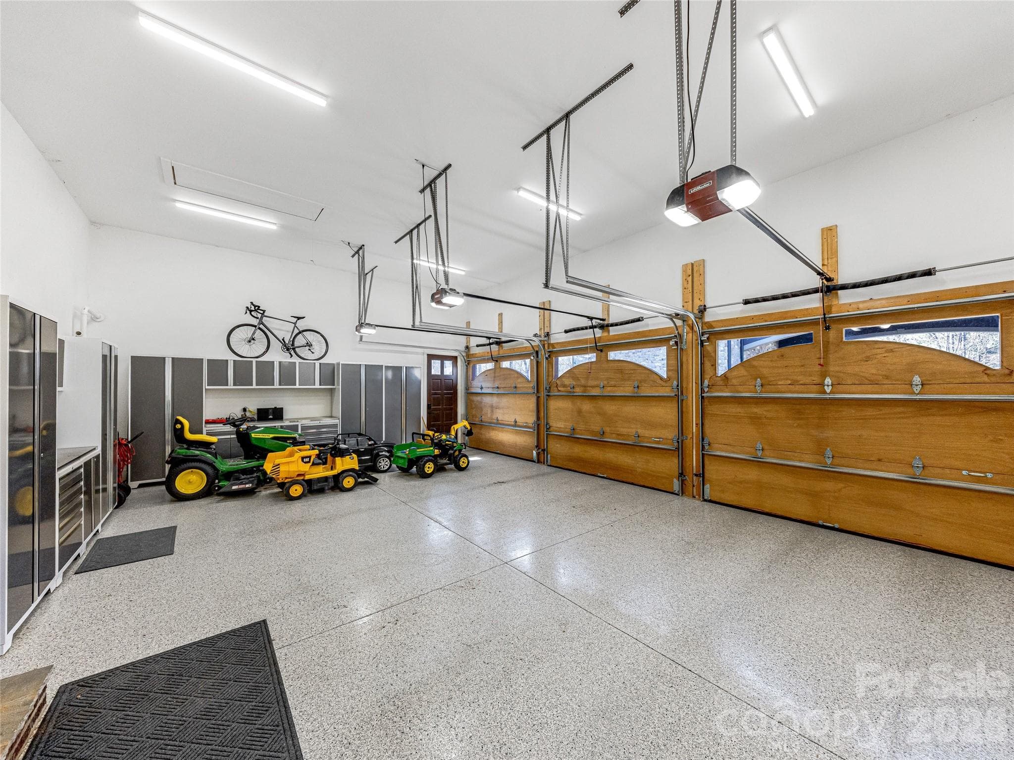 Main Level 3 Car Garage - New Custom Flooring - 1905 White Tree Trail, Arden
