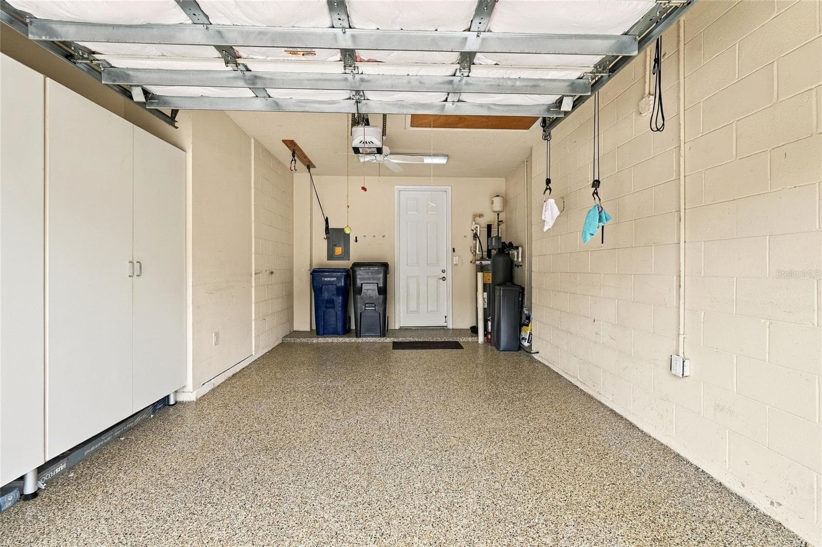 Garage has epoxy floor and storage cabinets - 7946 TYBEE CT, UNIVERSITY PARK