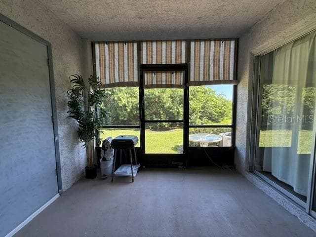 screened patio with canvas window covers. access from primary bedroom too - 11201 122ND AVE #209, LARGO