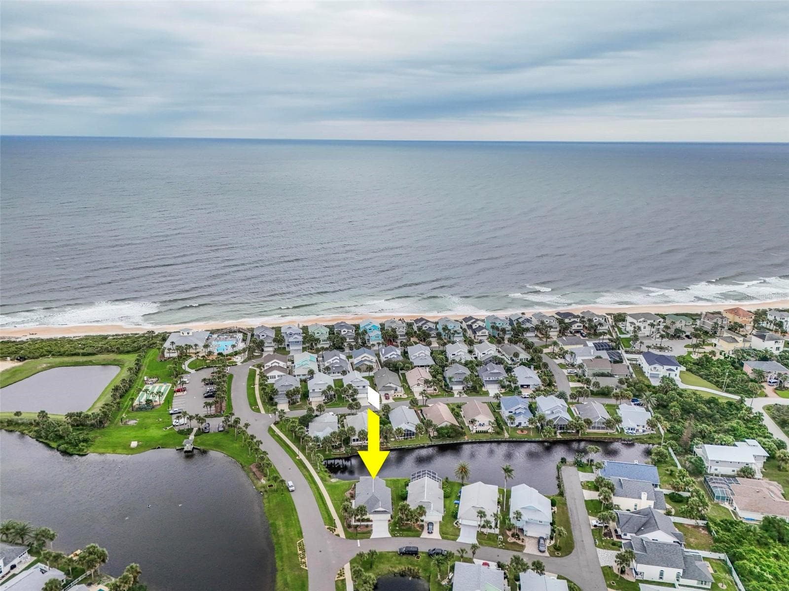 Aerial view Steps to BEACH -Clubhouse heated pool and spa - 50 MEDFORD DR, PALM COAST