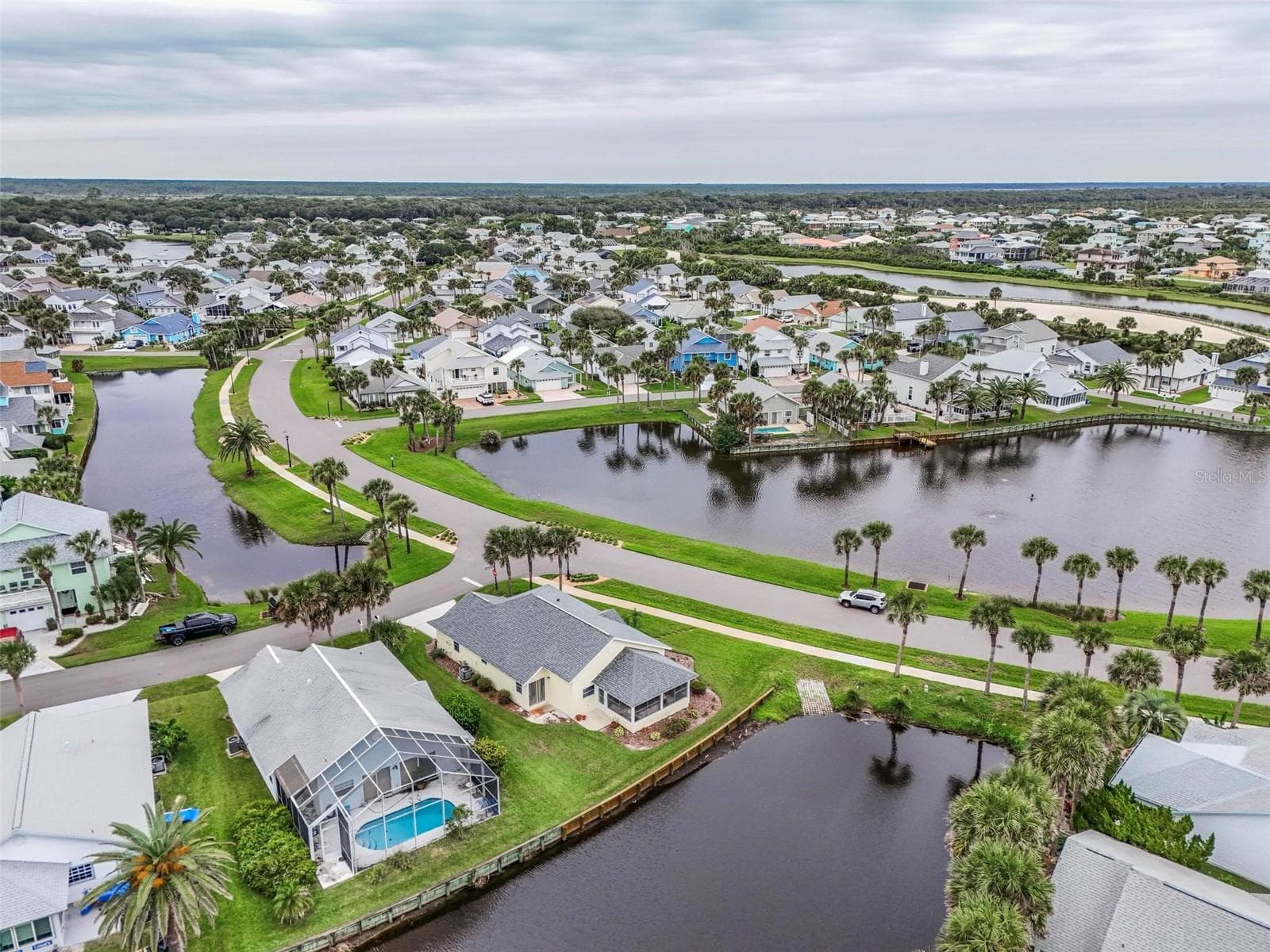 Intracoastal at top of picture-canal in front-Lake view with fountain in front of house and canal behind. Beautiful water views-Watch nature! Hear the waves! - 50 MEDFORD DR, PALM COAST