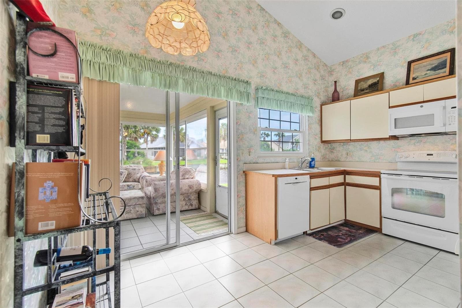 Eat in kitchen opens to Florida room - 50 MEDFORD DR, PALM COAST