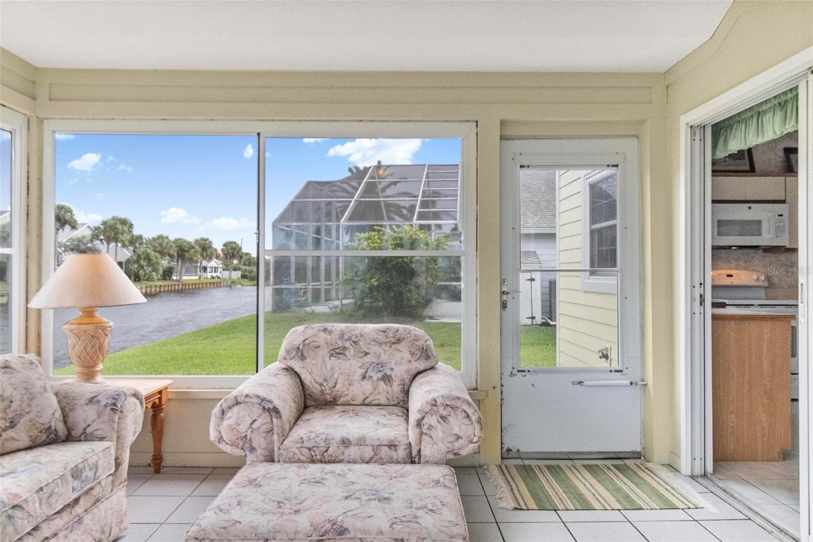 Door leads to patio - 50 MEDFORD DR, PALM COAST