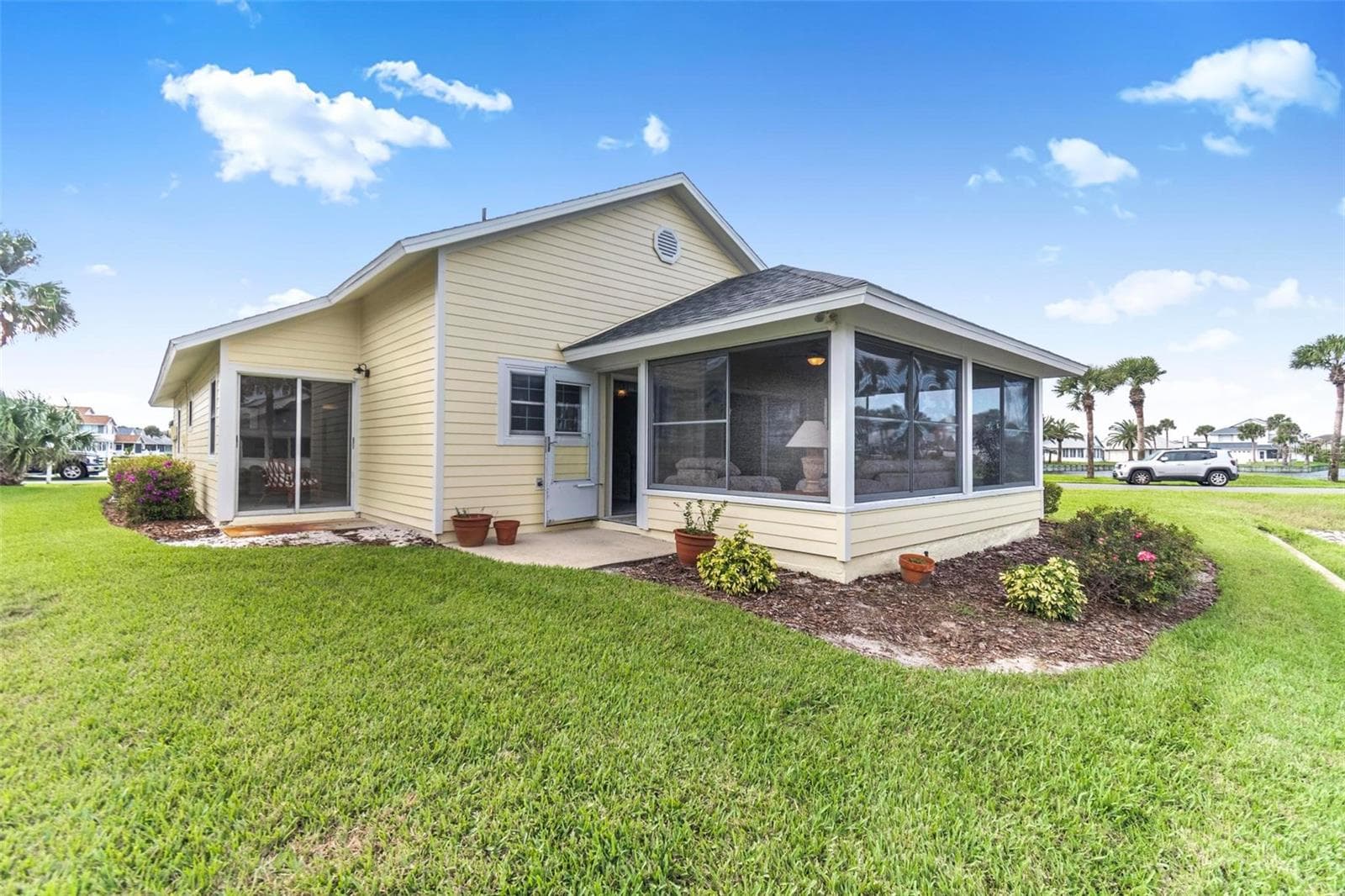 Back view of florida room - 50 MEDFORD DR, PALM COAST