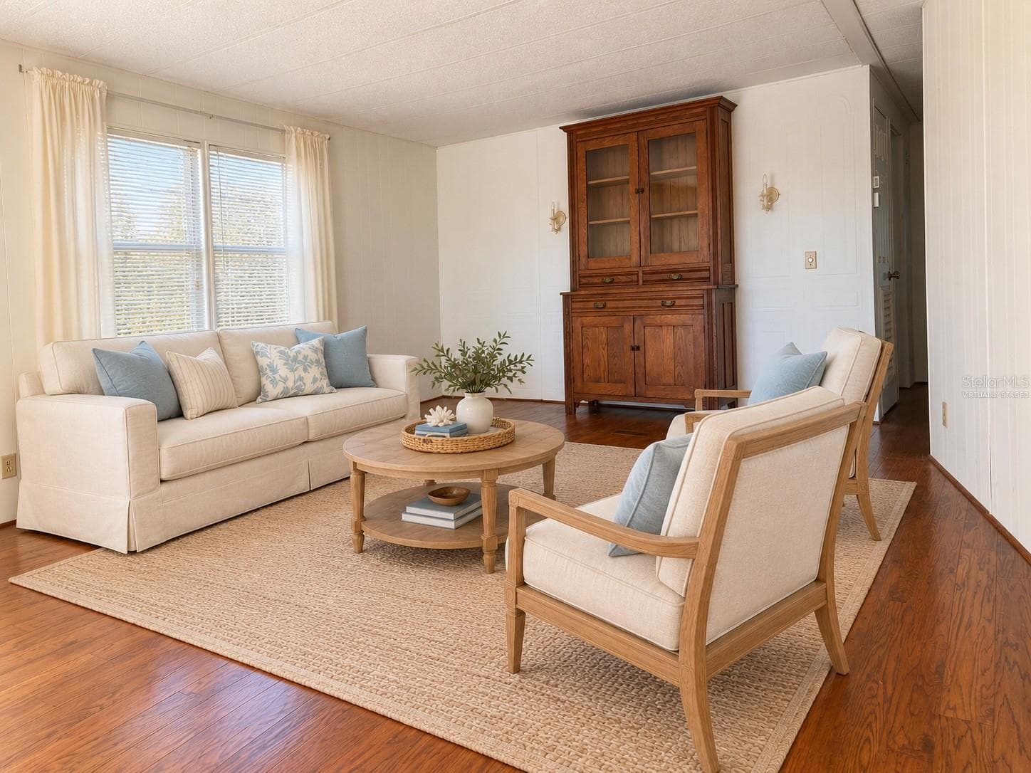 Living Room virtually staged - 808 53RD AVE E #35, BRADENTON