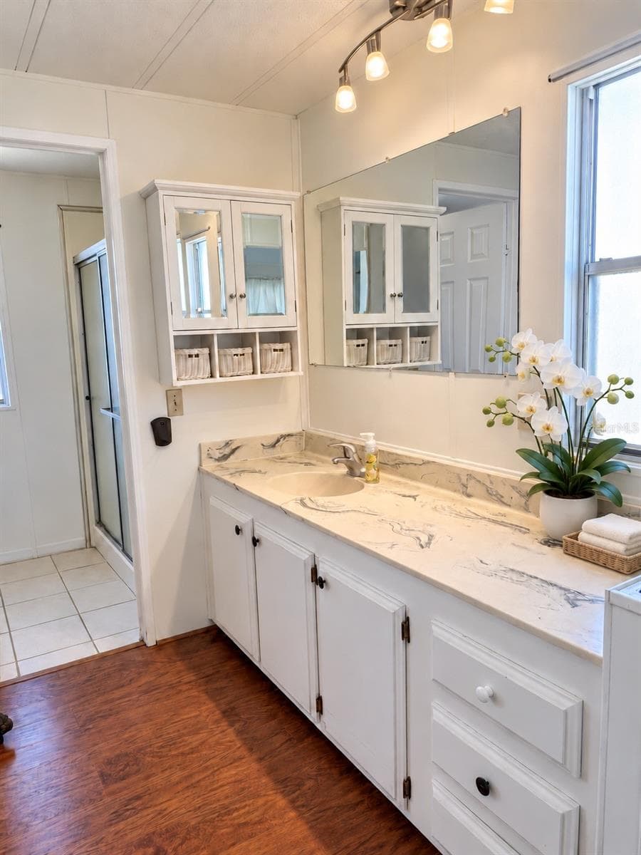 Dressing area of Prime bathroom leading into the shower - 808 53RD AVE E #35, BRADENTON