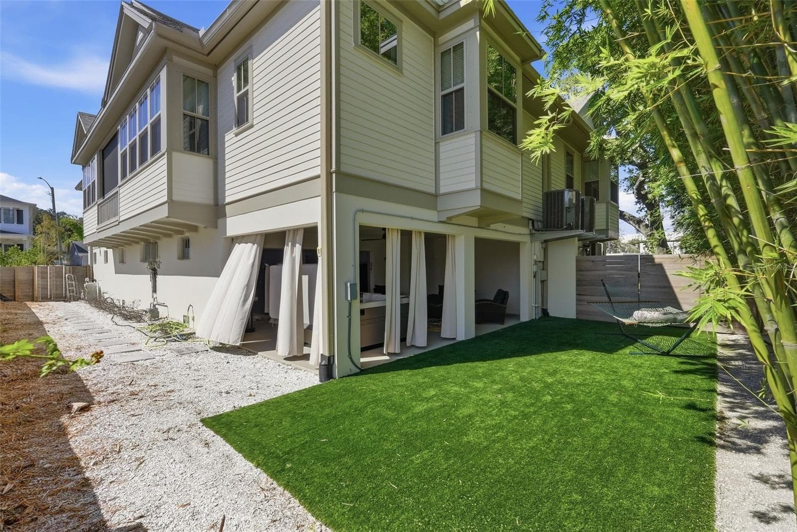 Back and side yard of townhome - 1208 5TH ST S, ST PETERSBURG