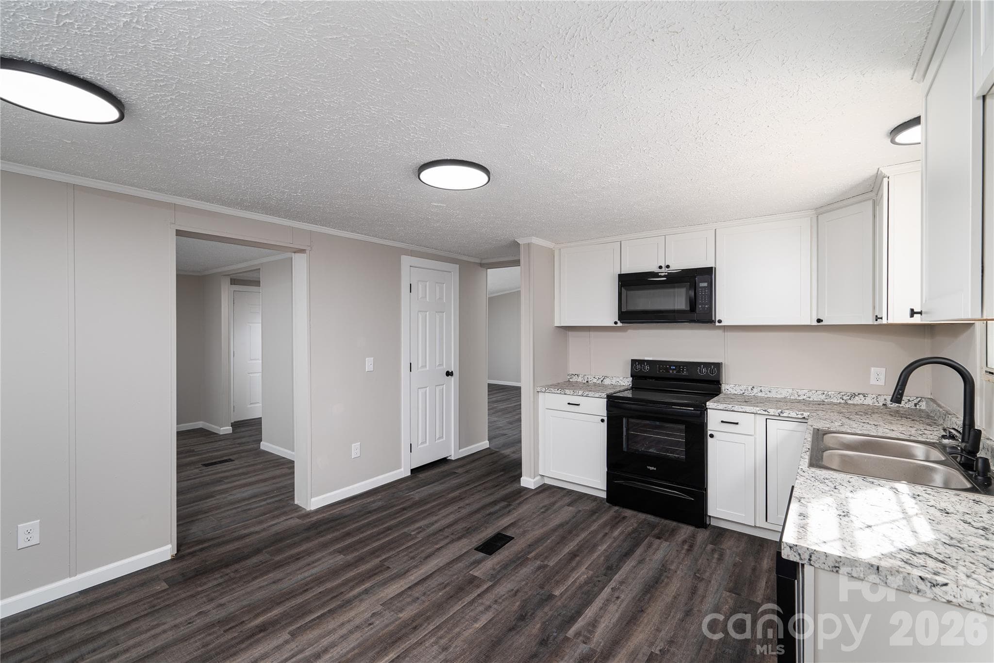 Brand new kitchen from floor to cabinets to counter tops to appliances. - 5047 Longbow Pointe, Kings Mountain