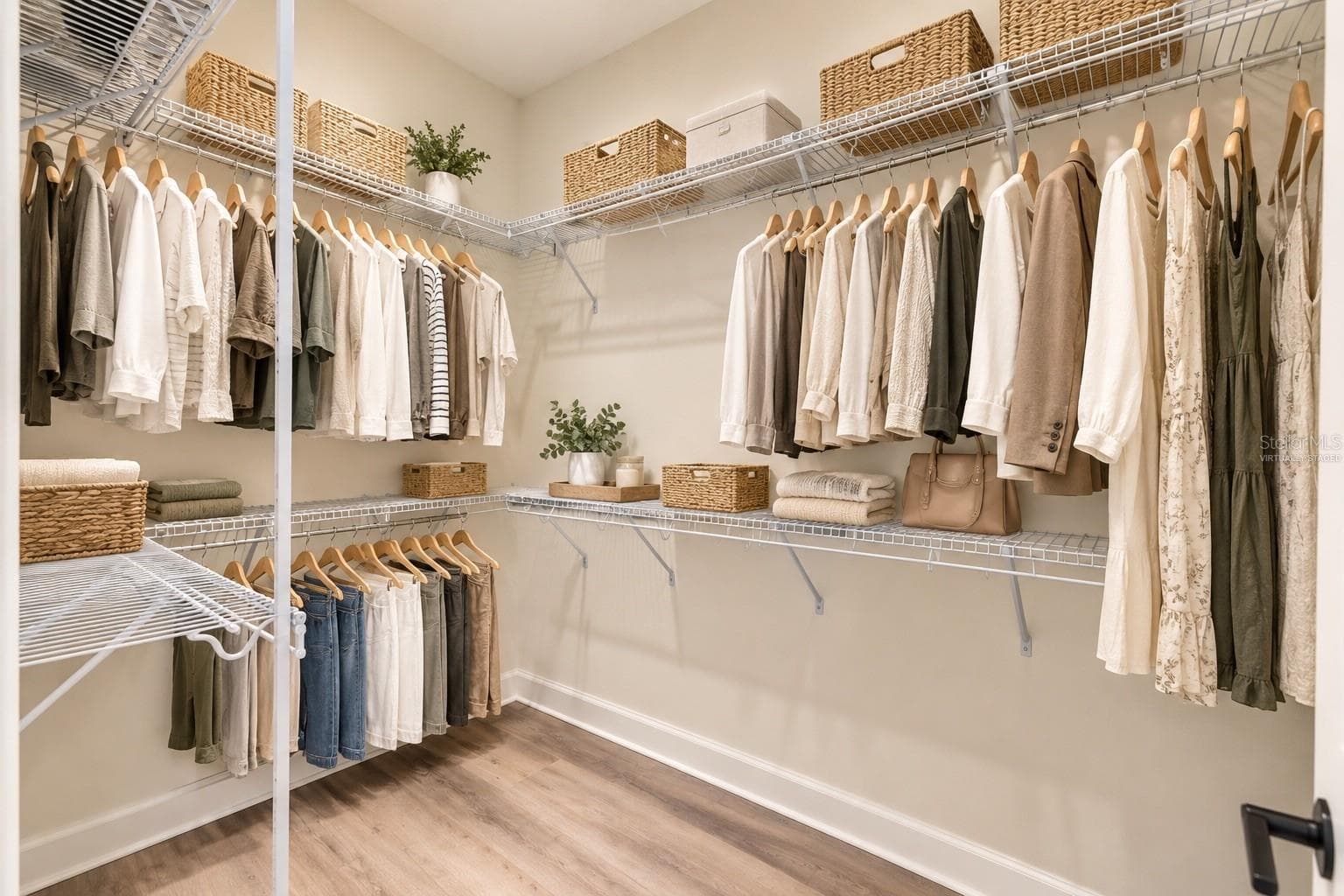 Virtually stagedwalk in closet primary - 12014 SAPPHIRE DR, SPRING HILL