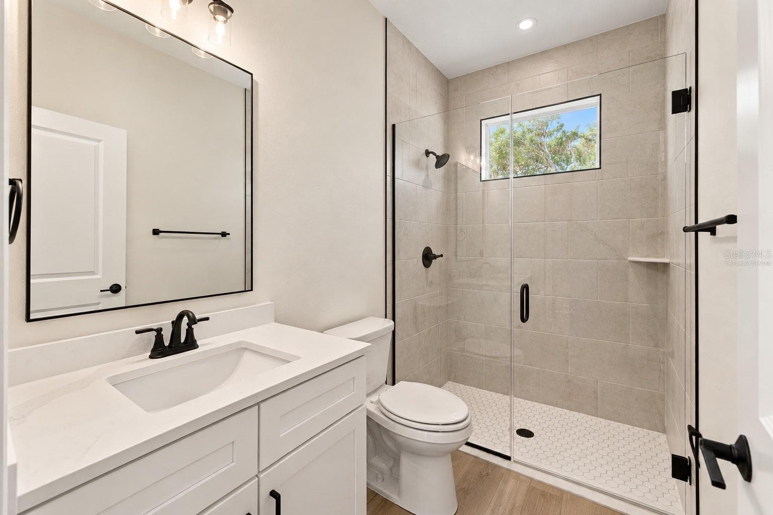 Virtually stagedguest bathroom - 12014 SAPPHIRE DR, SPRING HILL