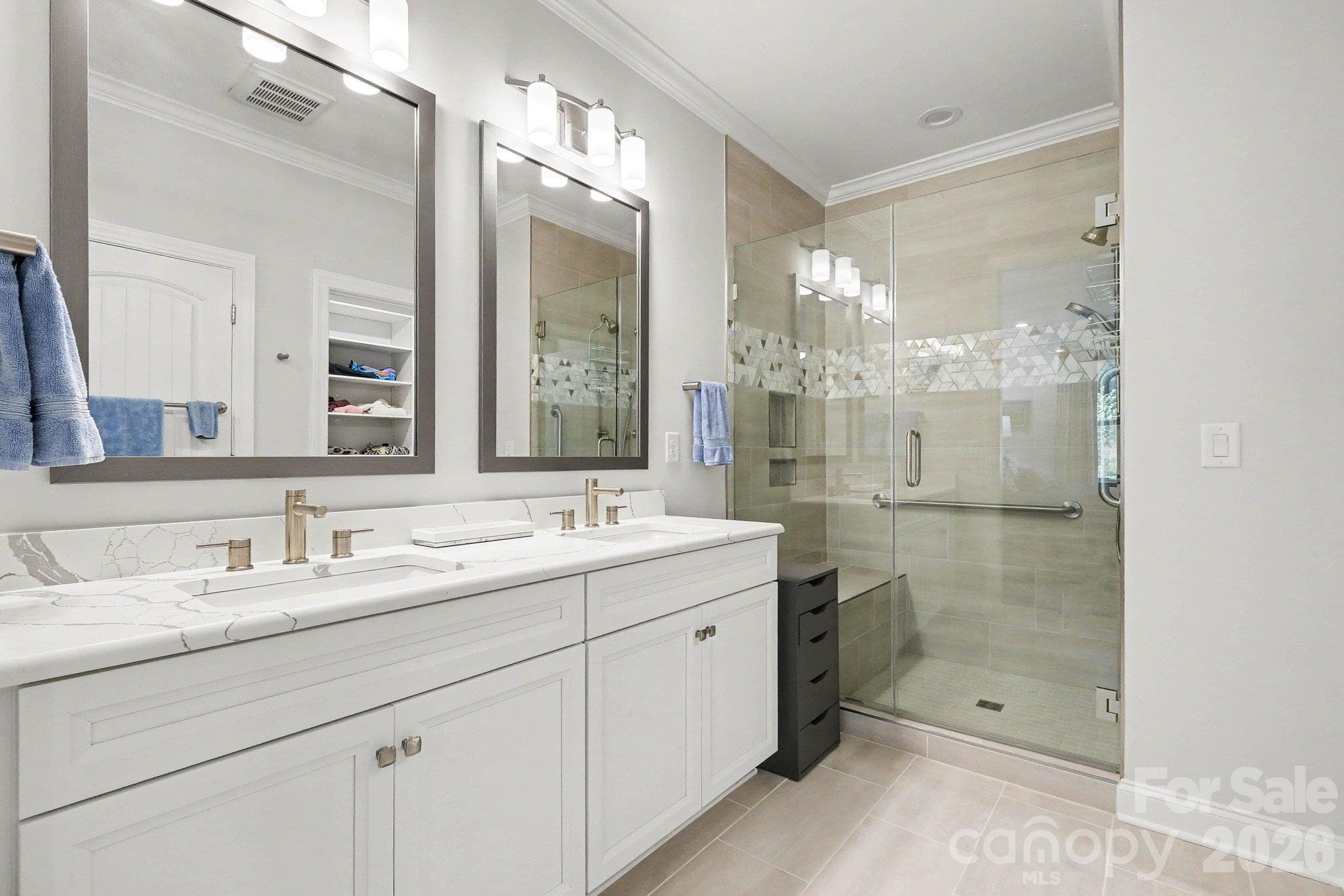 Luxurious Primary suite with quartz counters and double sinks - 5605 Caneel Lane, Denver