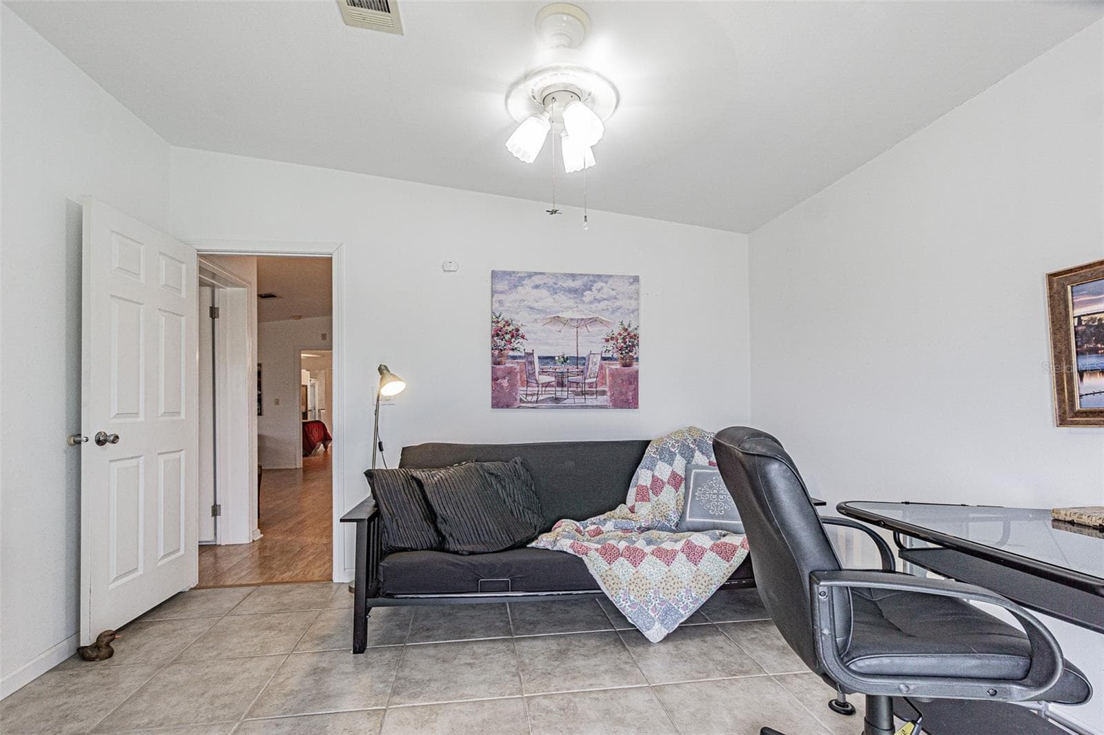 Futon in office doubles as 3rd or guest bedroom - 37449 GILL AVE, ZEPHYRHILLS