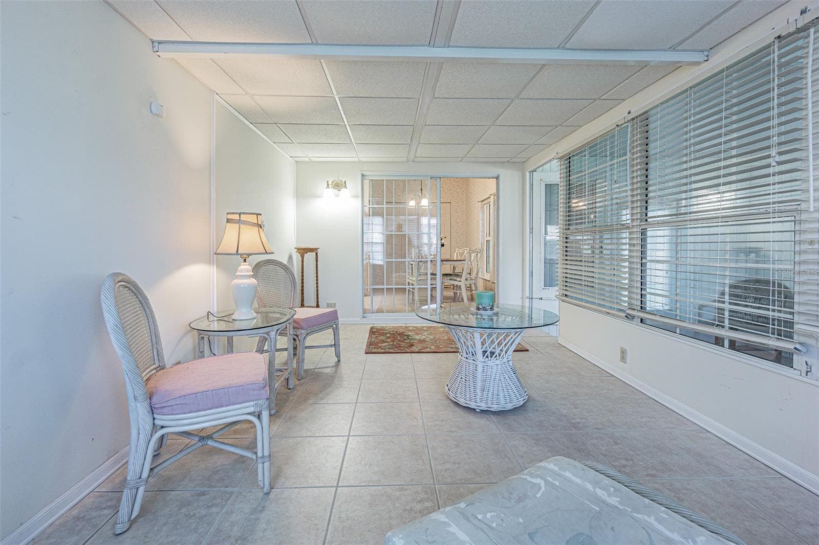 Ceramic tile floors and wall AC in Florida room - 37449 GILL AVE, ZEPHYRHILLS