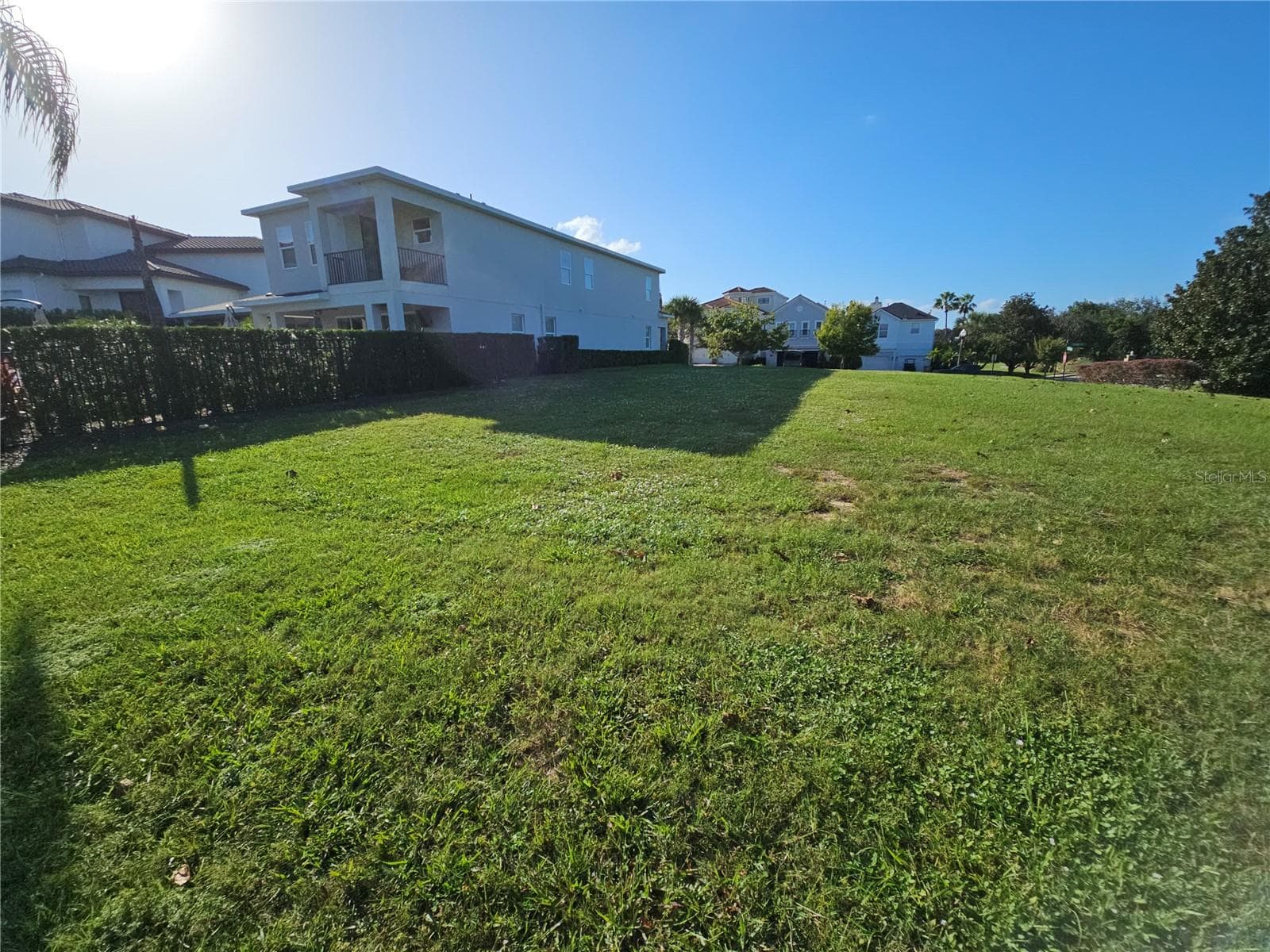 Standing near back of lot looking toward front - 1403 TITIAN CT, REUNION