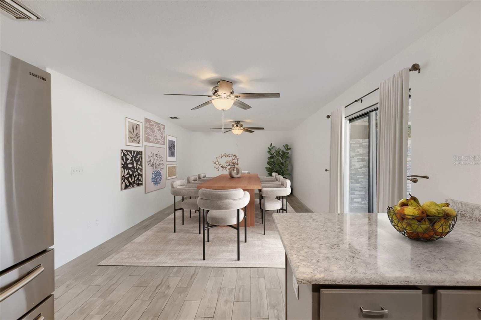 Family Room Virtually Staged - 6053 28TH ST S, ST PETERSBURG