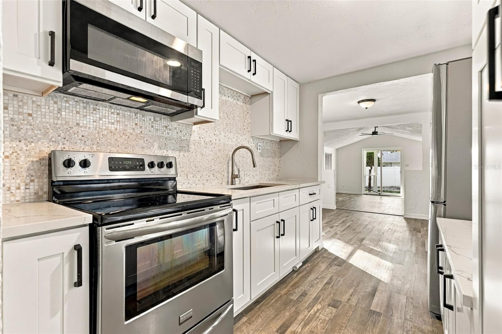 Galley kitchen - 3940 55TH AVE N, ST PETERSBURG