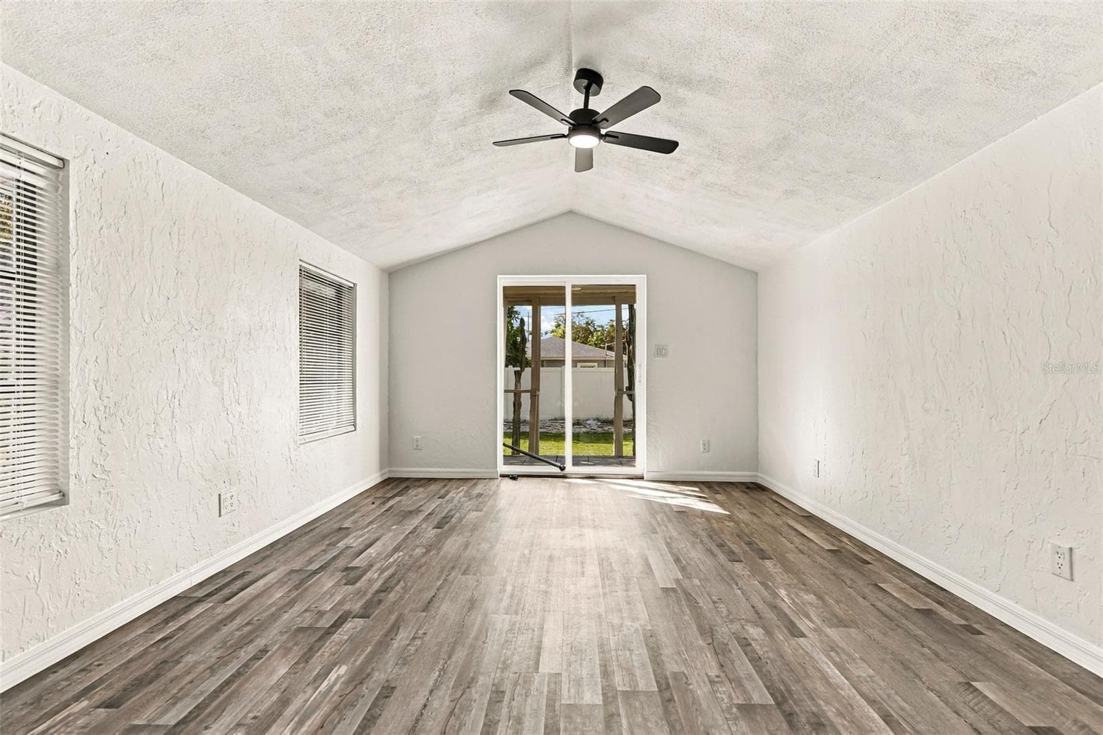 Bonus room with sliders to the backyard - 3940 55TH AVE N, ST PETERSBURG
