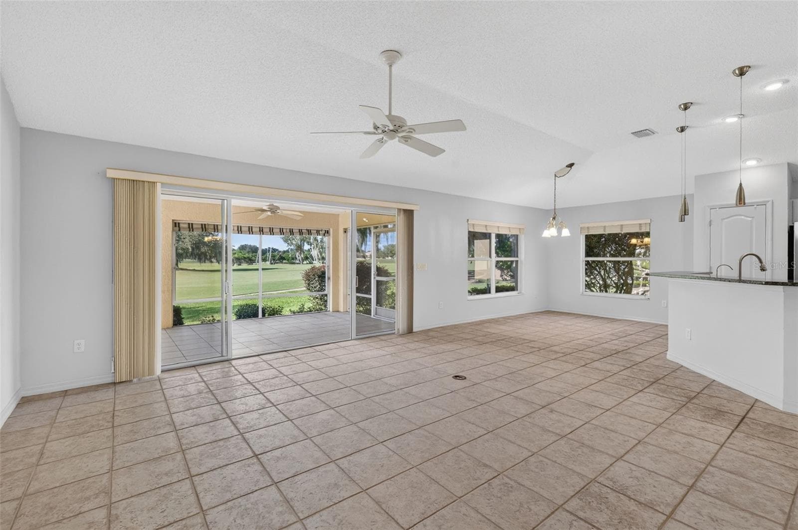 Living, Kitchen, and Dinette - 16840 SE 85TH SAPELO CT, THE VILLAGES