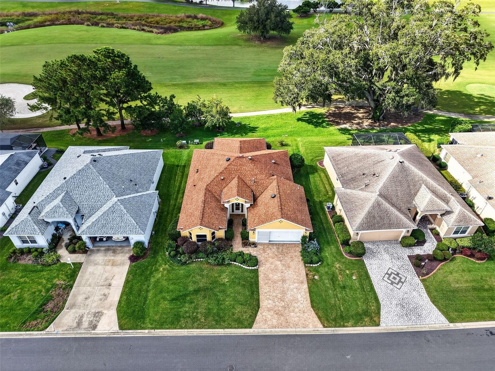 Aerial Front Elevation with GOLF and WATER VIEWS! - 16840 SE 85TH SAPELO CT, THE VILLAGES