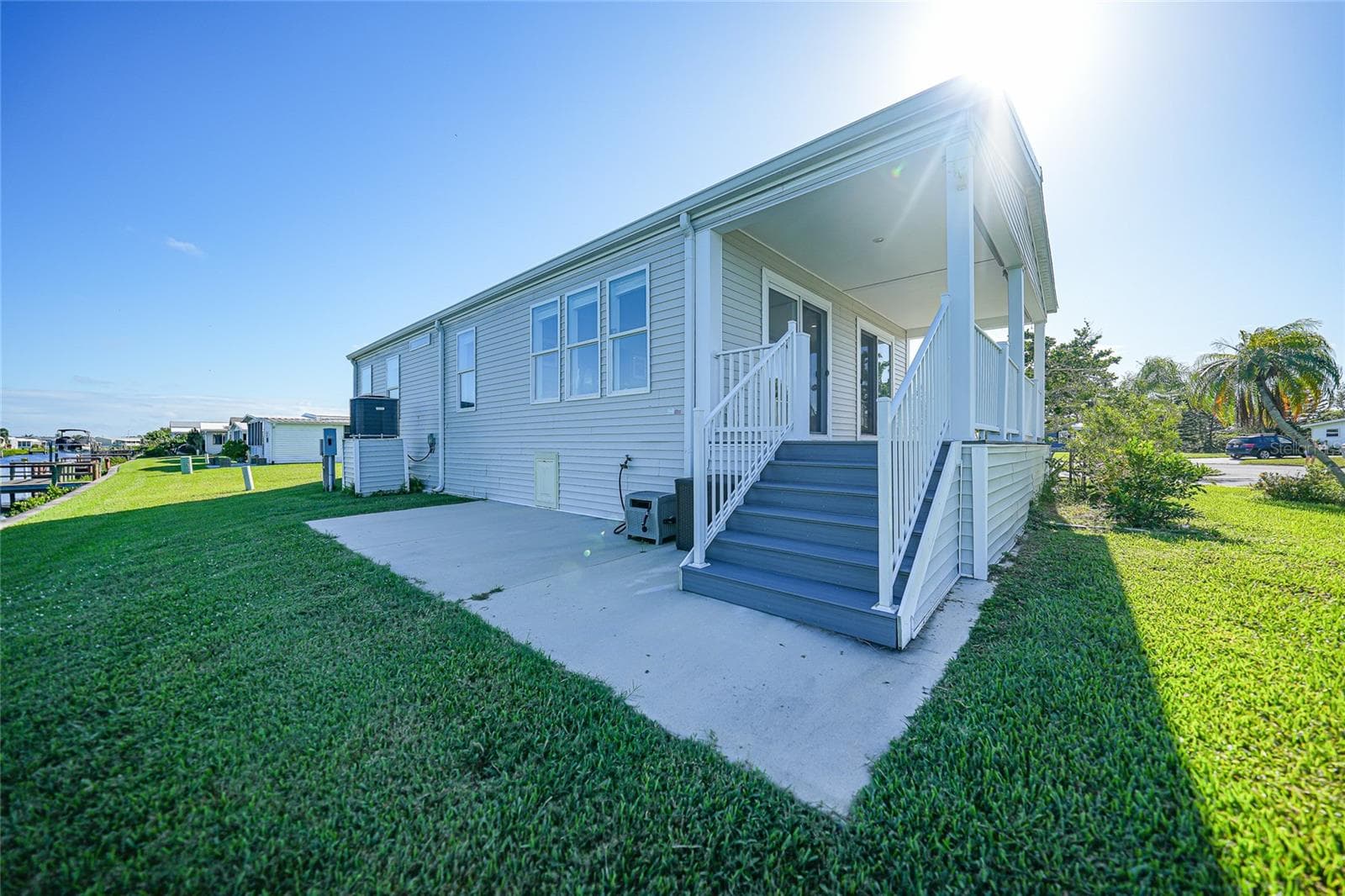 Back of home on Canal - 734 BLACKBURN BLVD, NORTH PORT