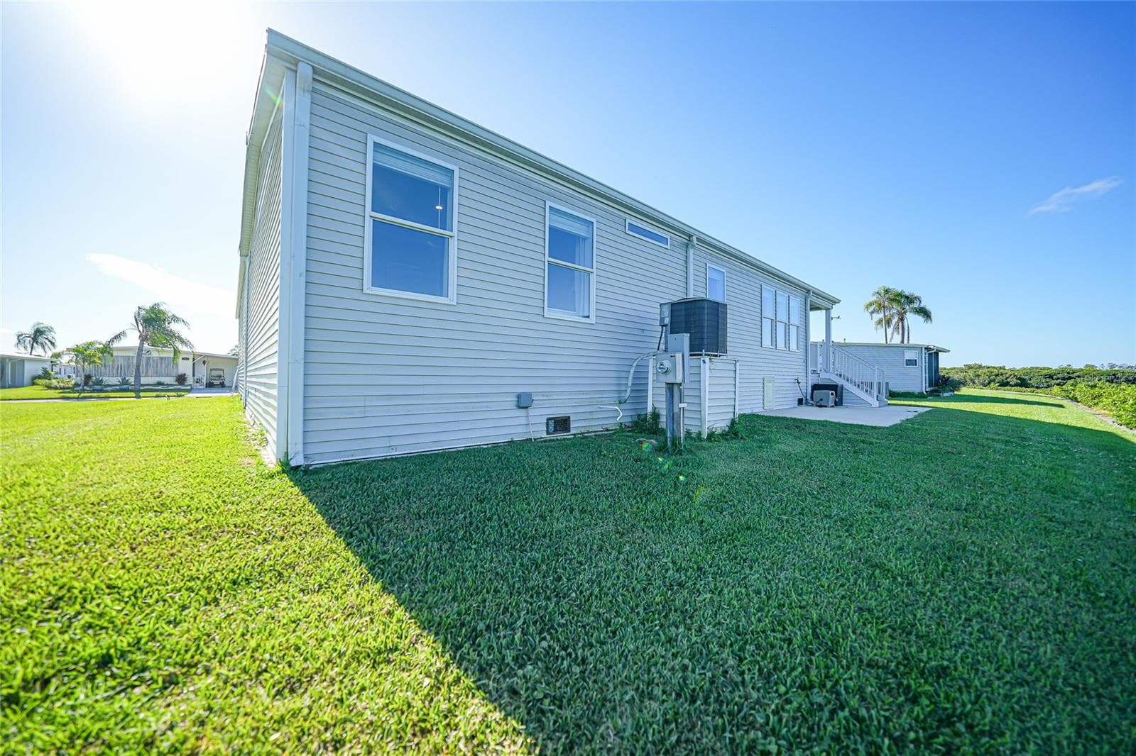 Back of home on Canal - 734 BLACKBURN BLVD, NORTH PORT