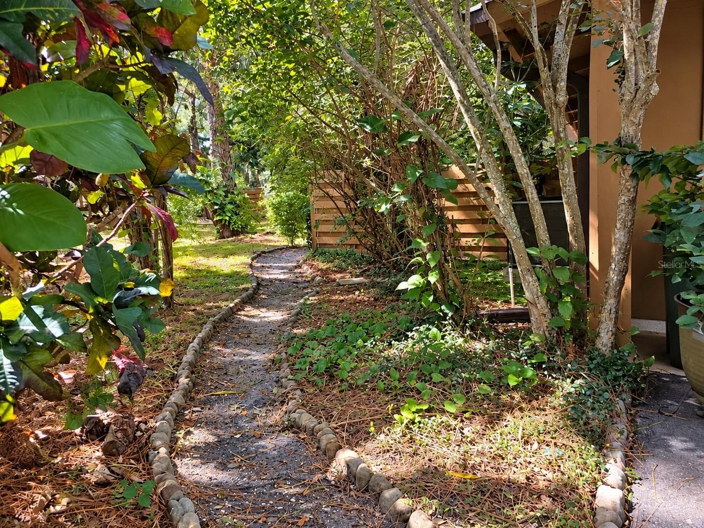 walkway to backyard - 2310 QUAIL CT, BRADENTON