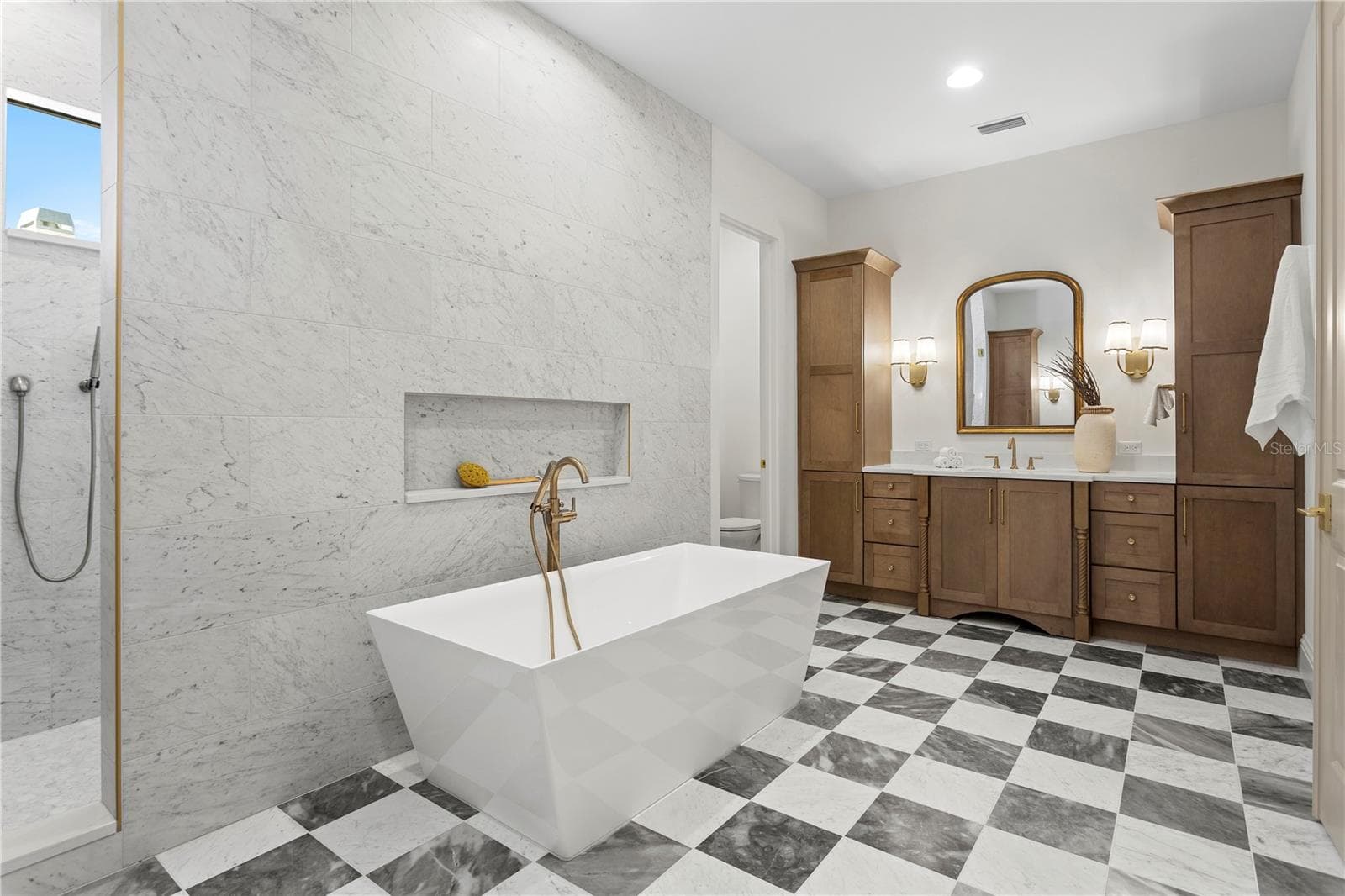 Primary bath with marble floors - 5008 W DICKENS AVE, TAMPA