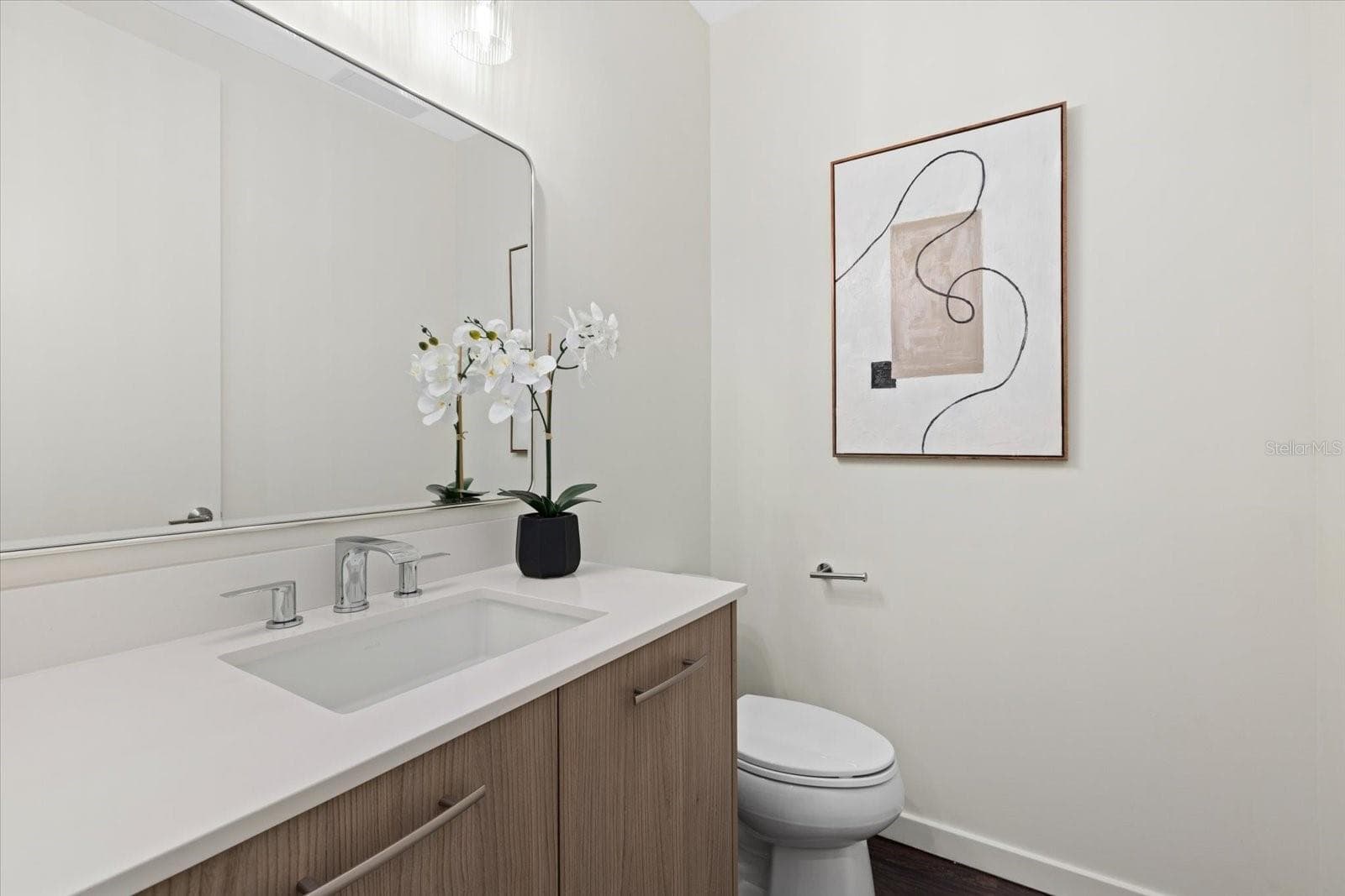 Powder room on main level - 1350 5TH ST #306, SARASOTA