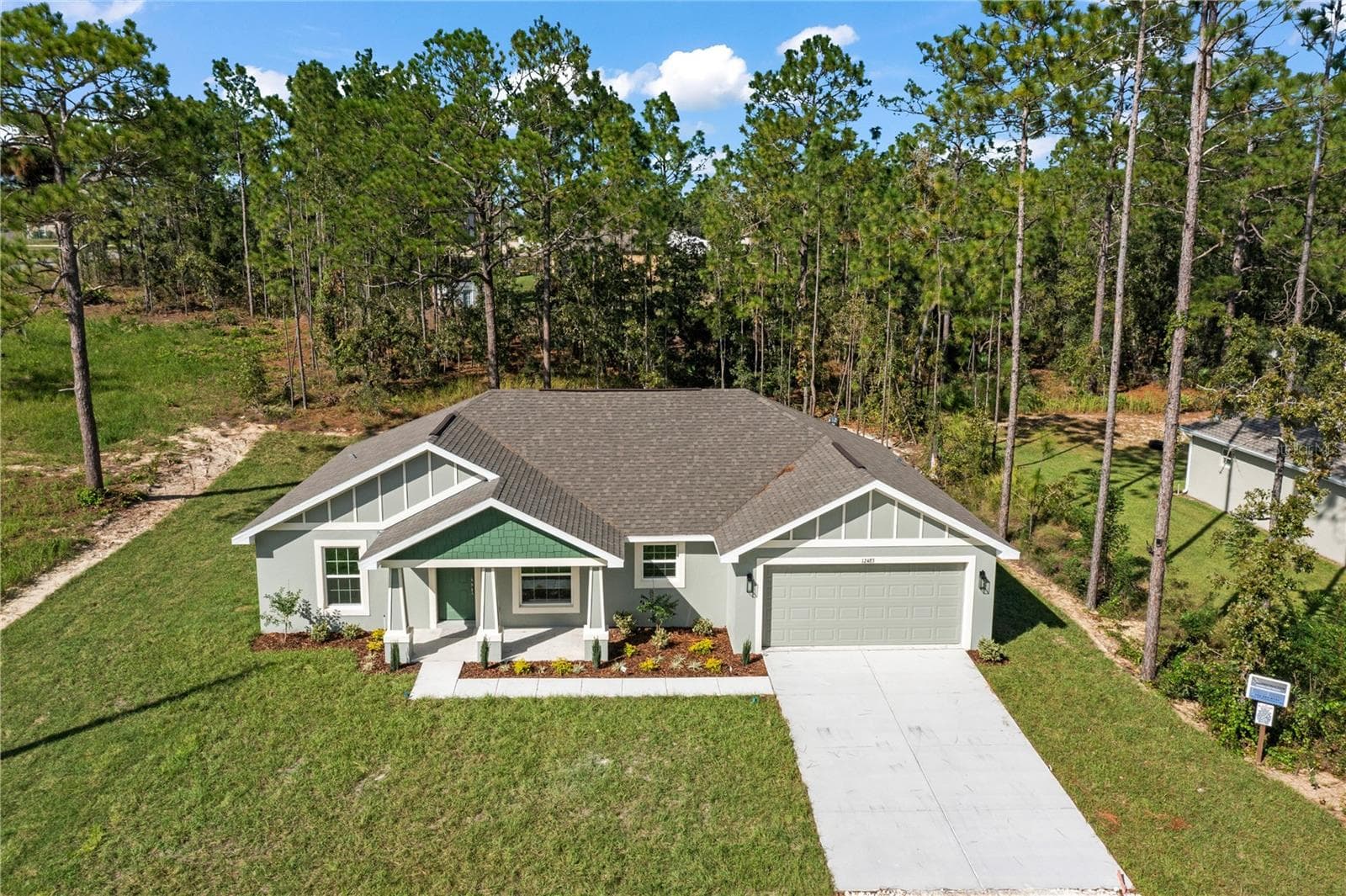 Single Family Residence at 12483 DOWNY WOODPECKER RD, WEEKI WACHEE, photo 2 of 44