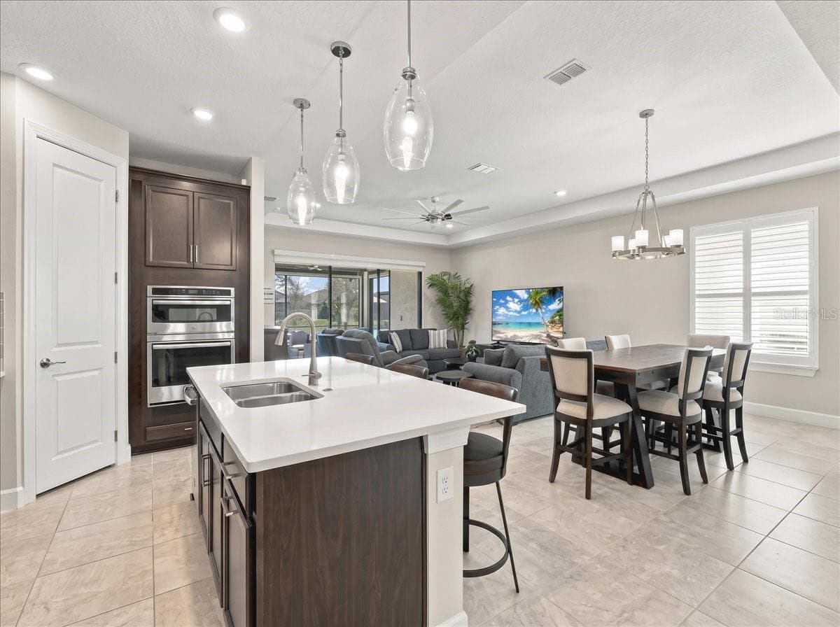 There is tile throughout the home and carpet in all 3 bedrooms . - 4732 CRESTPOINT WAY, PALMETTO