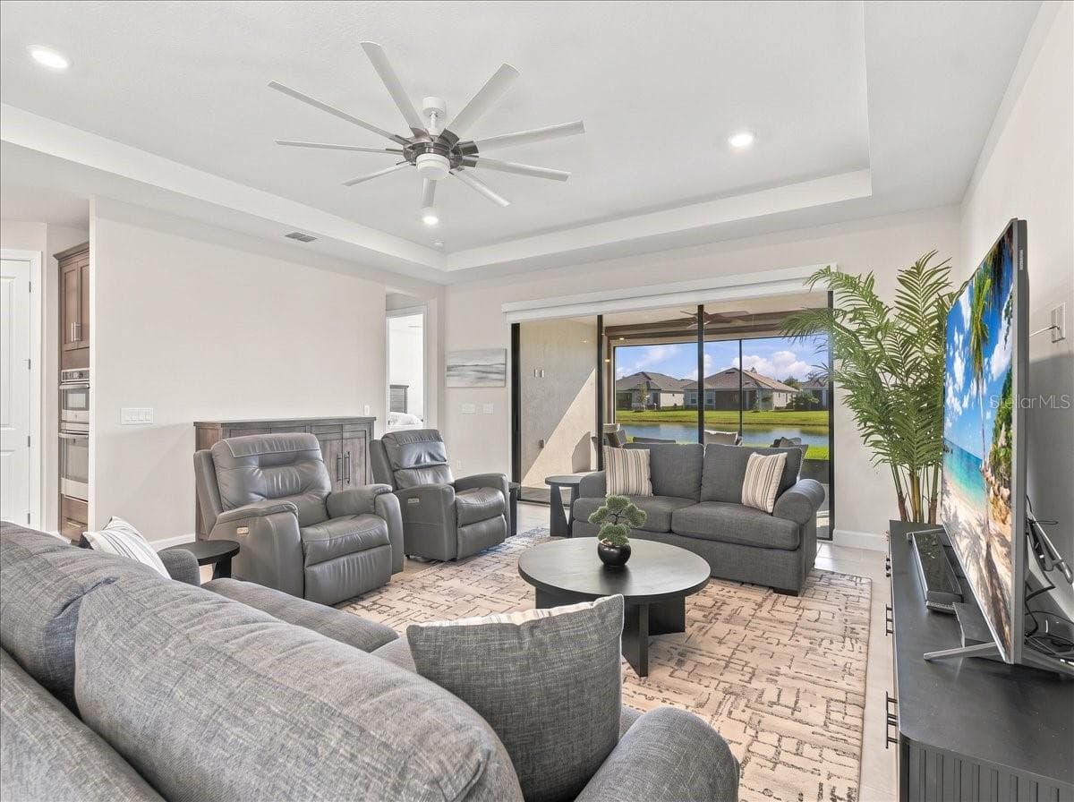 There are power privacy shades on the sliders. - 4732 CRESTPOINT WAY, PALMETTO