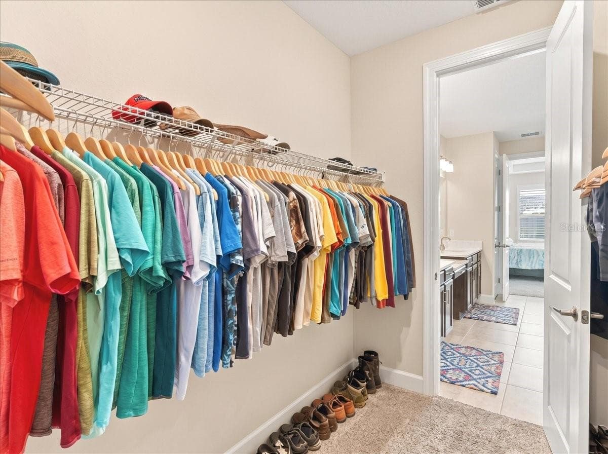 The walk-in closet features a pass-through door directly into your laundry room. - 4732 CRESTPOINT WAY, PALMETTO