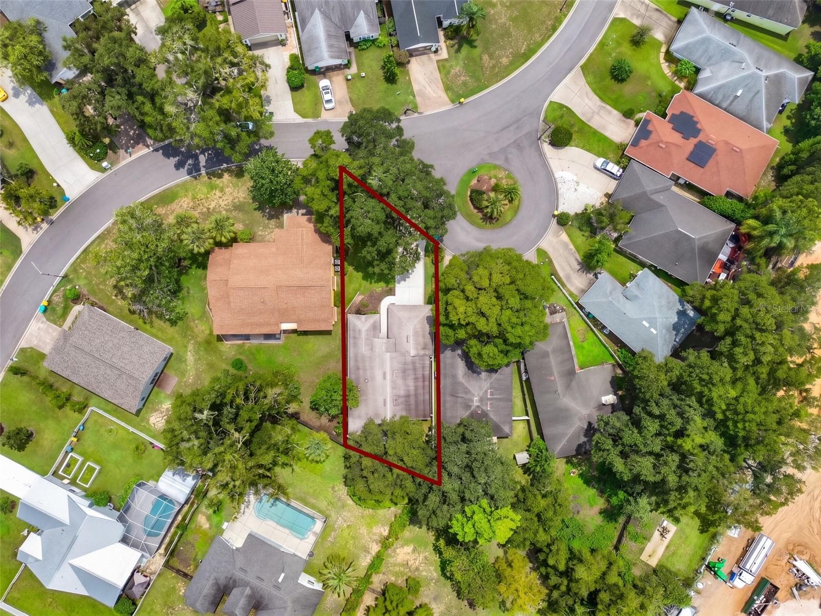 An aerial view highlights the homesite and its position within the surrounding neighborhood. - 71 ORANGE BLOSSOM DR, EUSTIS