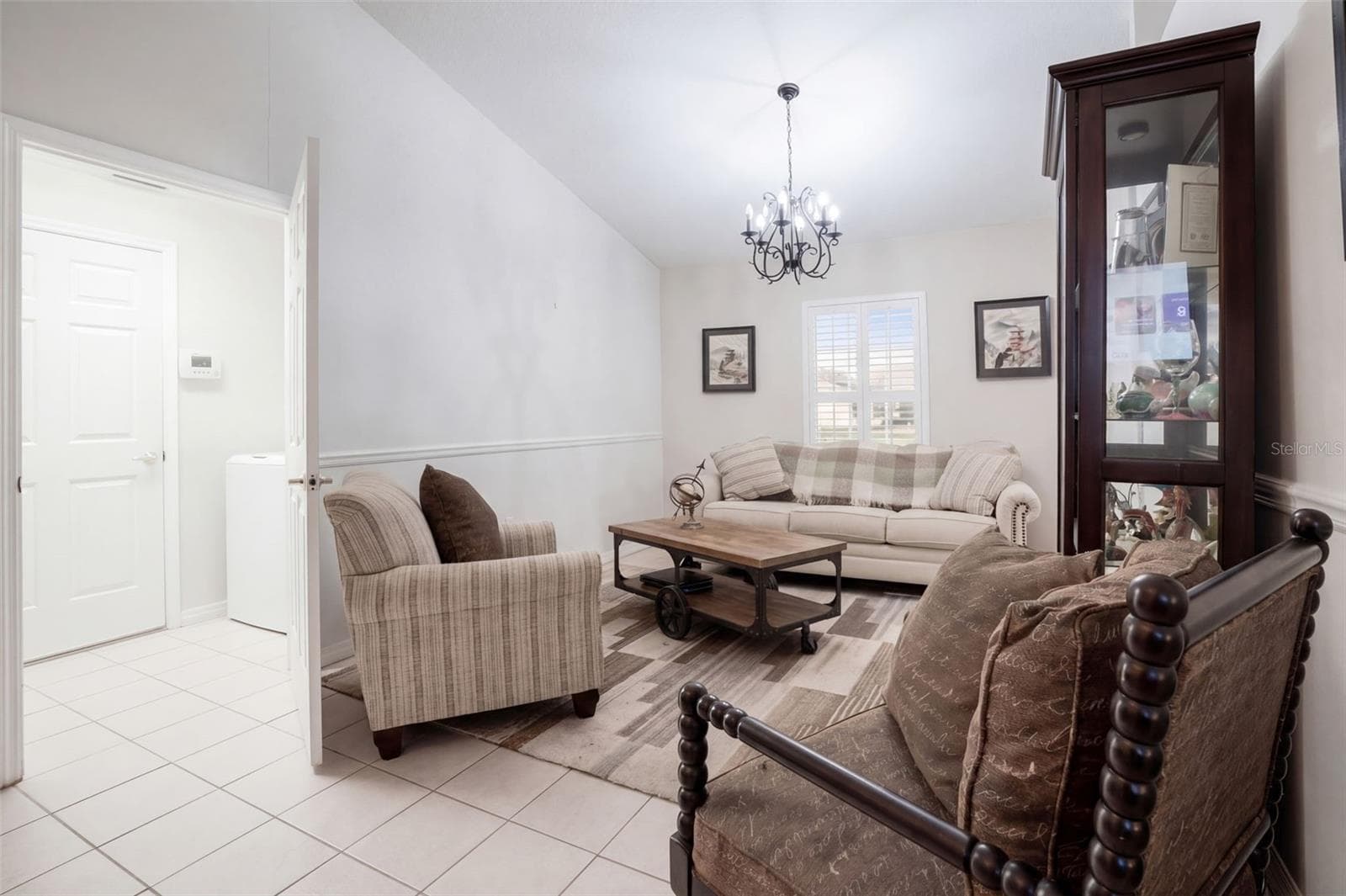 A flexible second living or dining space adds options for everyday life and entertaining. - 71 ORANGE BLOSSOM DR, EUSTIS