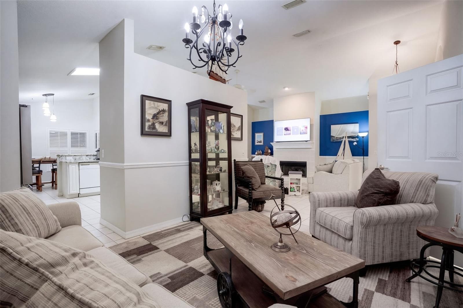 The flexible front room connects naturally to the main living area. - 71 ORANGE BLOSSOM DR, EUSTIS
