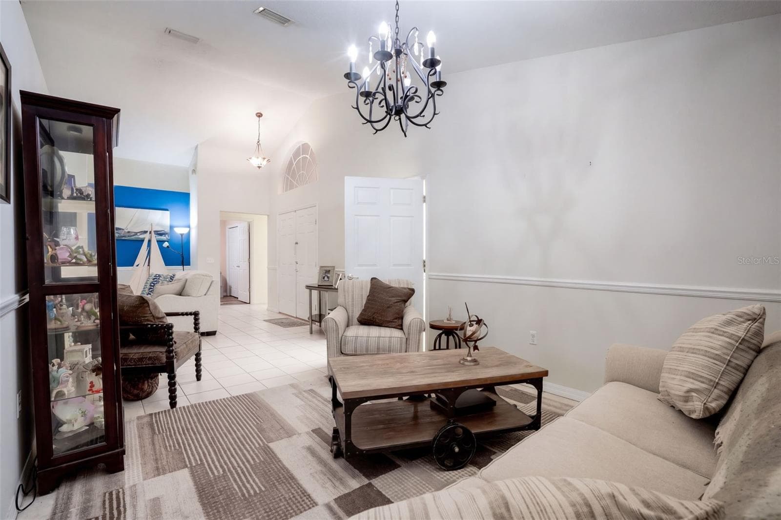 Another view shows the generous length and versatility of the front flex space. - 71 ORANGE BLOSSOM DR, EUSTIS
