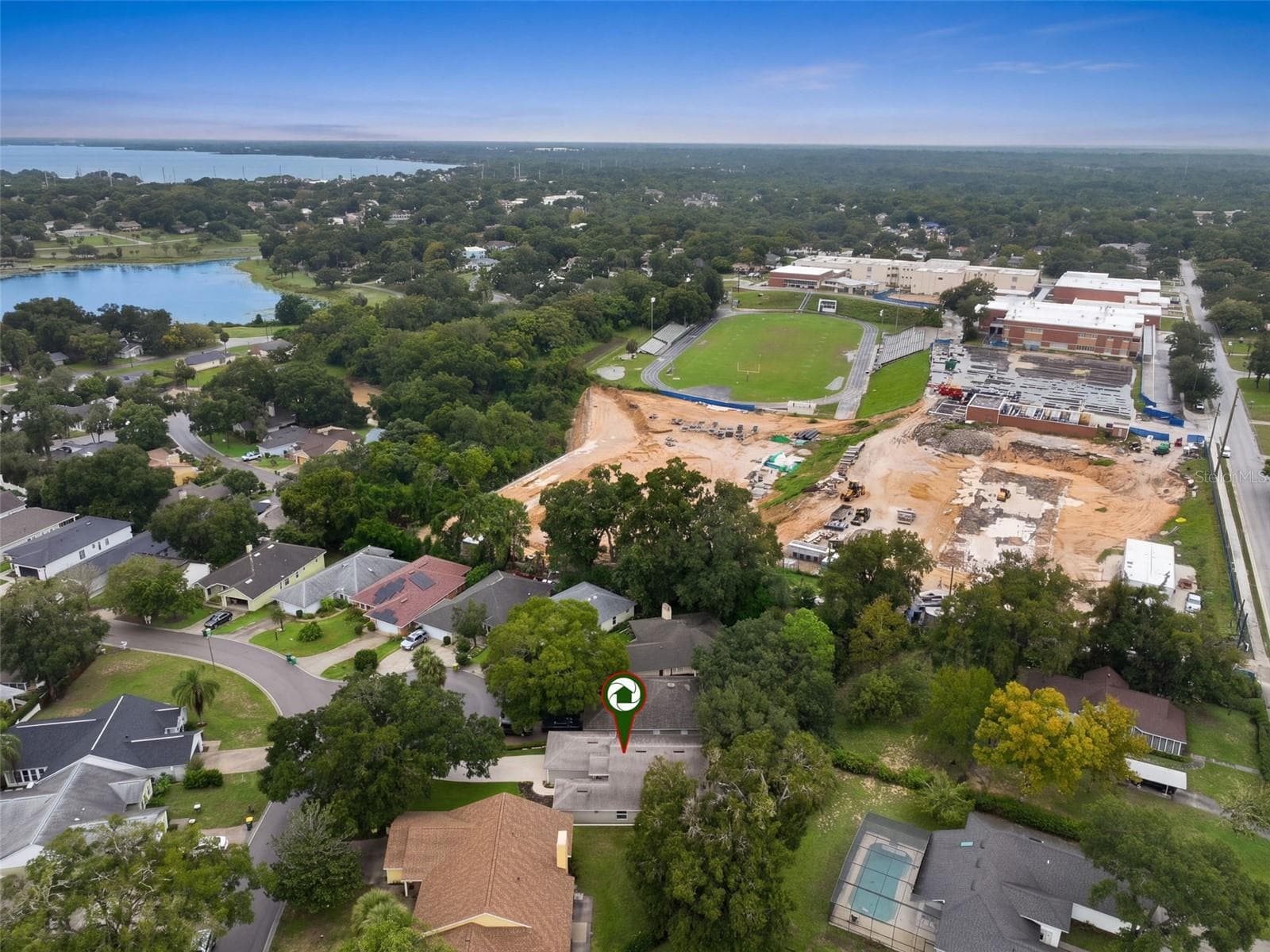 This aerial angle provides additional context for the home's convenient in-town location. - 71 ORANGE BLOSSOM DR, EUSTIS