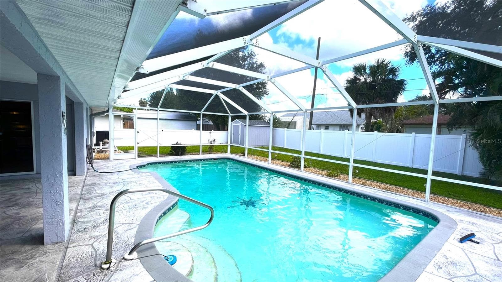 In ground concrete pool. - 1009 LABELLE TER NW, PORT CHARLOTTE