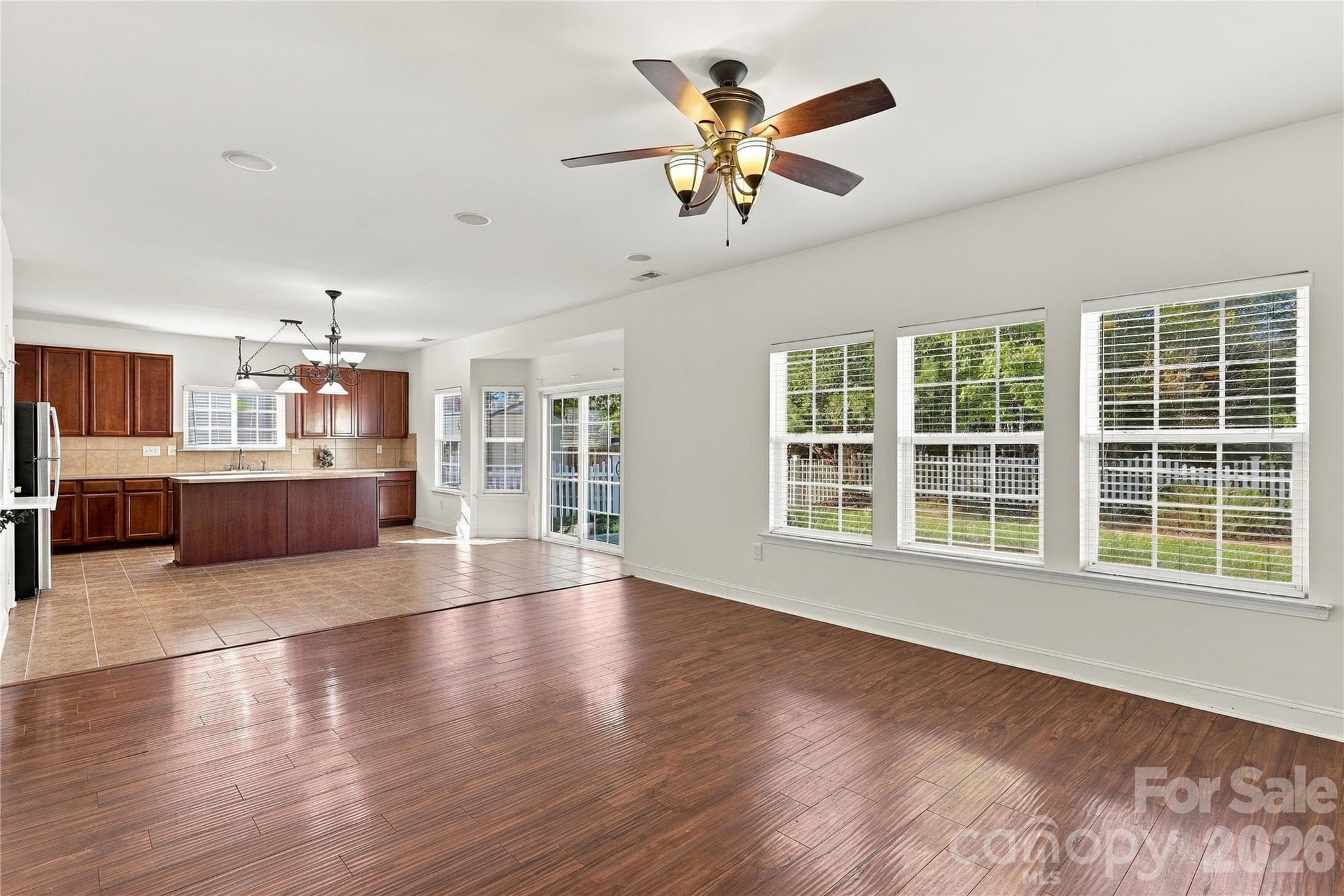 Bright windows and an open layout make hosting easy, from game day to the holidays. - 327 Annaberg Lane, Monroe