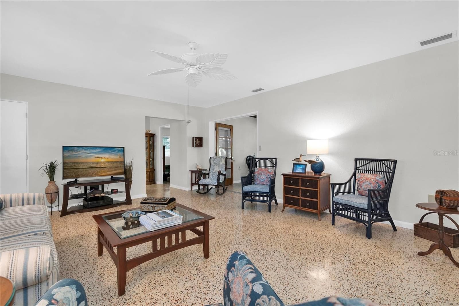 Mid century modern with original well maintained terrazzo floors in original part of the house. - 7106 PALM DR, HOLMES BEACH